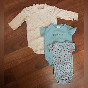3 Baby onesies.